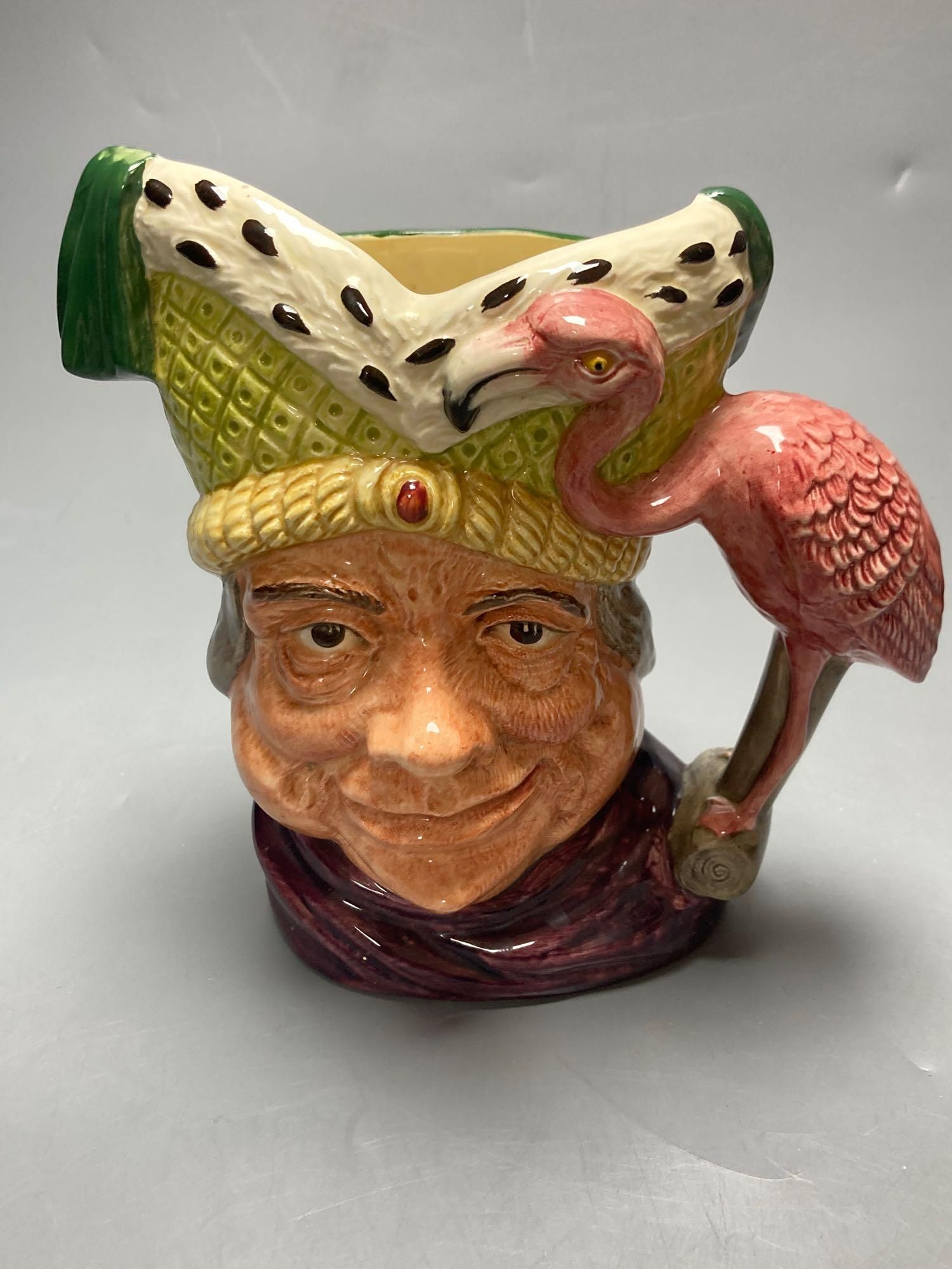 A Royal Doulton Ugly Duchess character jug, Royal Doulton Tony Weller musical character jug and Royal Doulton Old Charley ashtray